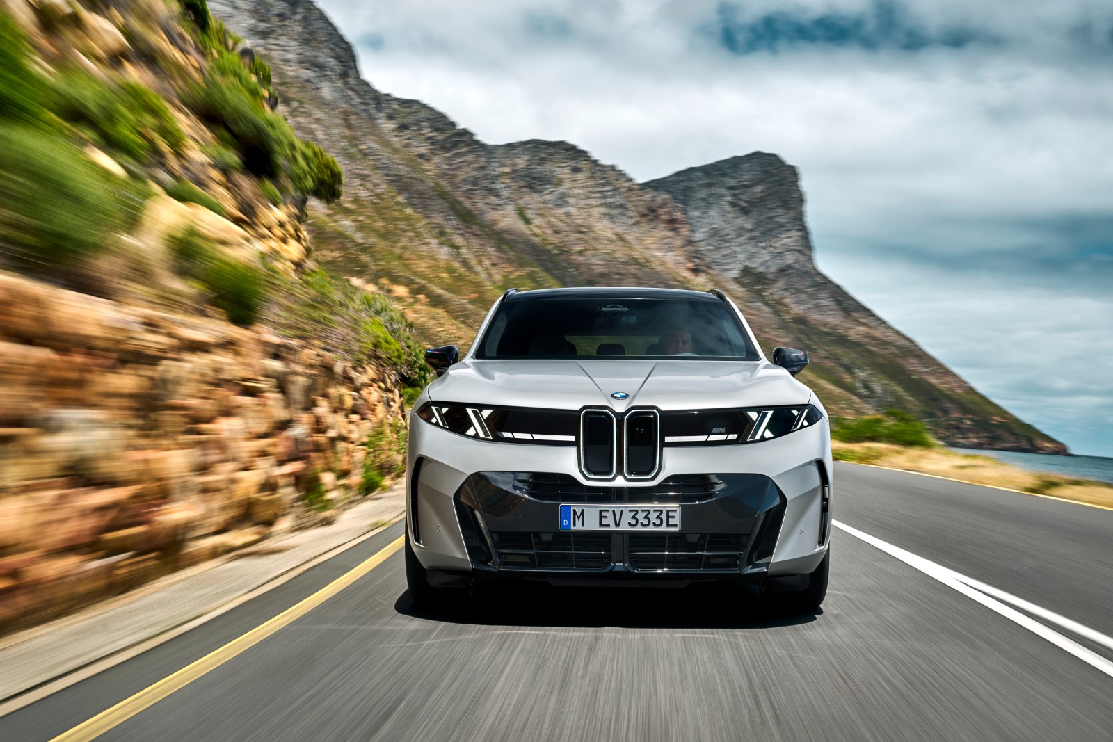 BMW's Next X5 Trades Its Old Handles For Flush Panels And A 435-Mile EV Sibling